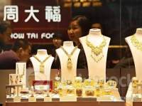 瑞银：维持周大福(01929)“买入”评级 目标价降至13.6港元