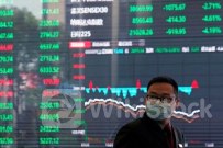 Chứng khoán châu Á trượt dốc, đồng Yên chao đảo trước phán quyết của BOJ