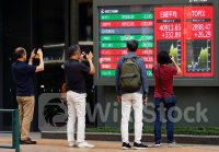 アングル：注目集める日本企業の業績進捗率、30％超なら「買い」目線 先取りの動きも